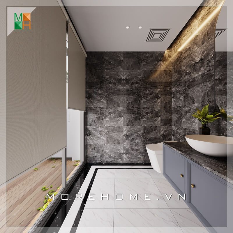 Phòng tắm được thiết kế bằng đá nhân tạo, ốp tường và lát sàn trắng - đen mang lại sự tinh tế, sang trọng và thẩm mỹ mà không bao giờ lỗi mốt.